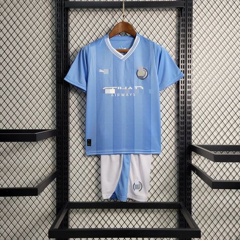 Conjunto Manch C 23-24 Local (Niño)